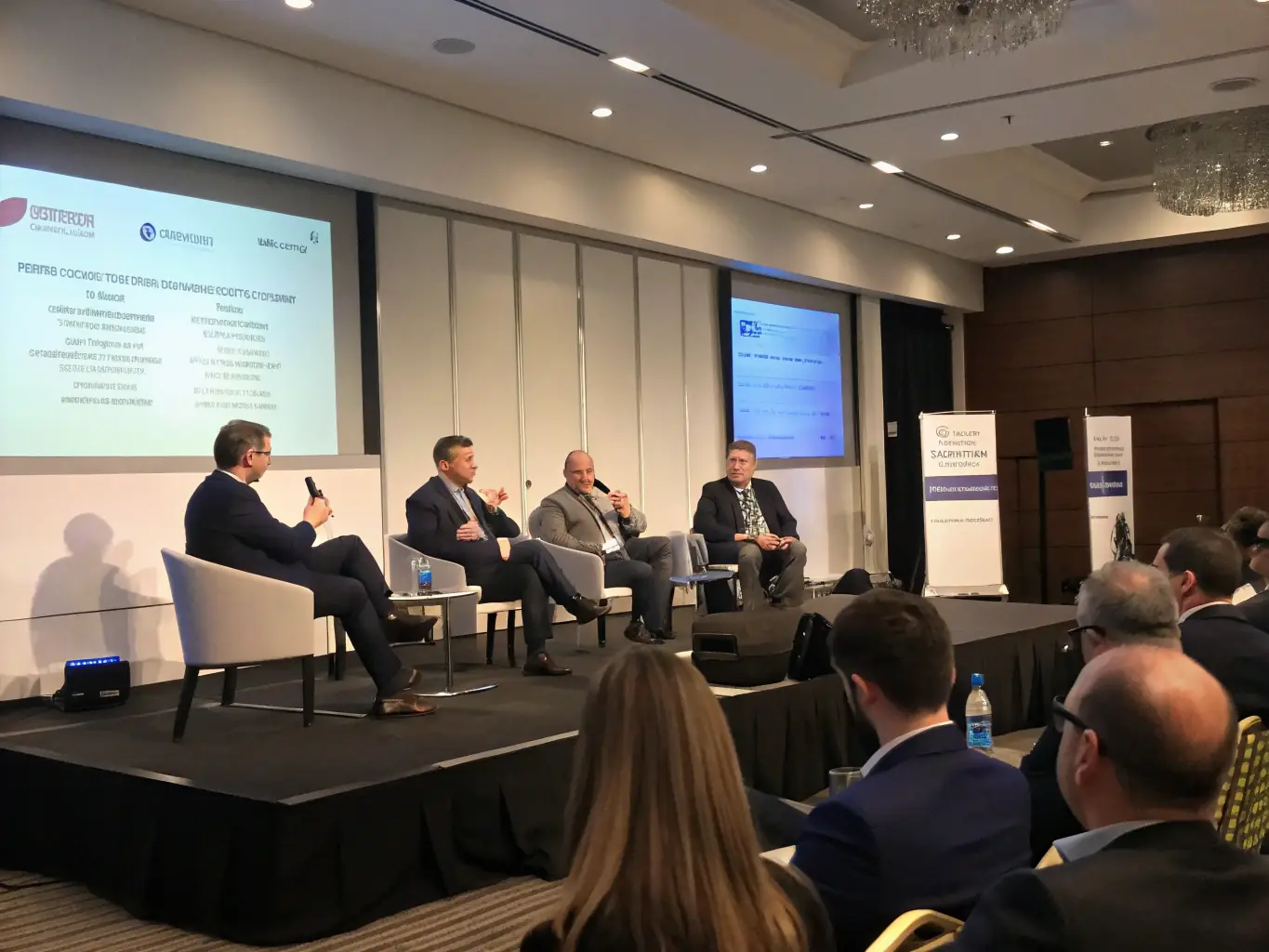 A dynamic image showcasing a panel discussion at a beverage industry conference, with experts sharing insights and engaging with the audience.